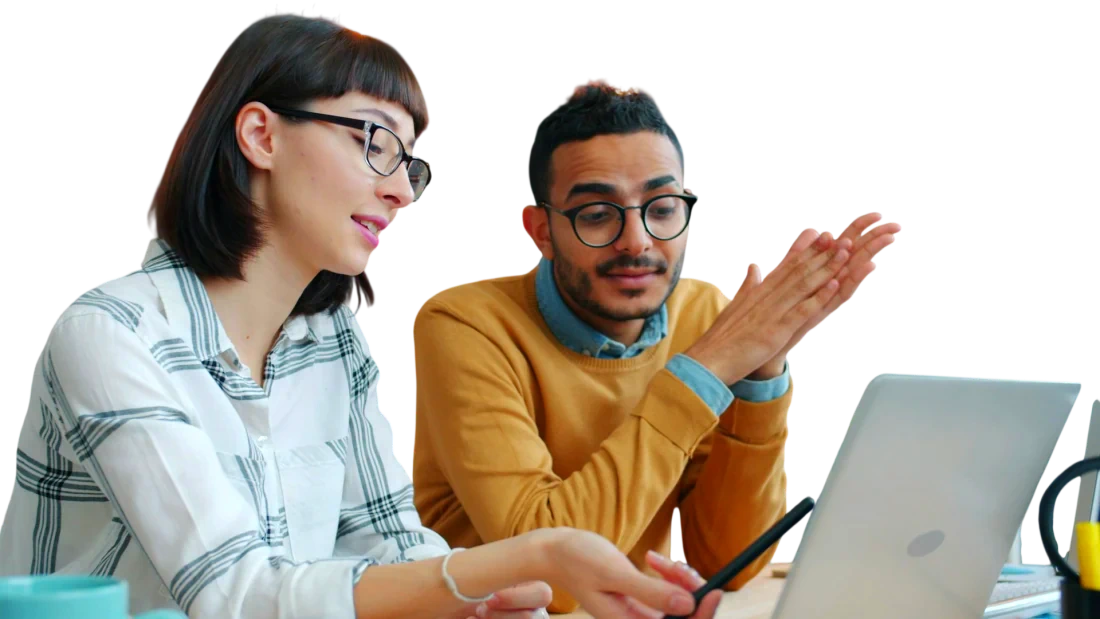 Two colleagues talking through a video on a laptop